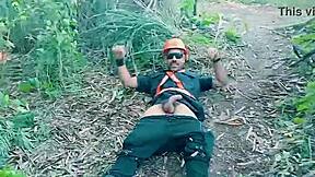 Uniformed Seguranças have fun in an orgy in the park