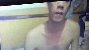 Seductive guy lures cute bro into web chat handjob.