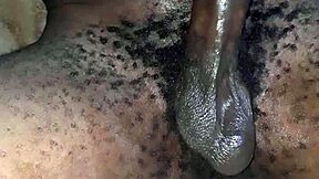 skinny african twink stroking hairy oiled black cock in solo play