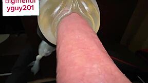 Young guy masturbates with fleshlight, moaning intensely