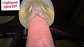 Young guy masturbates with fleshlight, moaning intensely