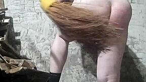 A fat Russian man endured a brutal spanking. His huge ass took a beating from a dirty broom.