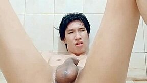 THAI GAY BOY Fagteetajet MASTURBATES DRINKS PISS CUM PENETRATES ASS