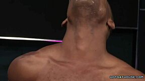 sexy black hunk interacts with white cock in interracial scene