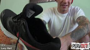 Tattooed guy creeps on feet in socks