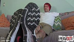 Tattooed guy creeps on feet in socks