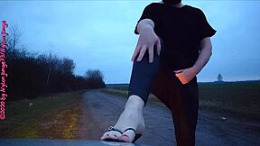 Amateur crossdresser explores outdoor fetish in leggings and shoes.