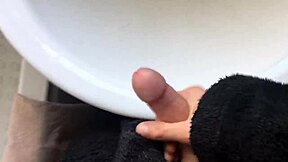 Solo gay twink masturbates and squirts in the bathroom with big cock blowjob