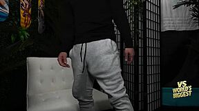 In the gym, this gay bro spots my huge cock in grey sweat pants. He begs for face fucking with cum and piss covering him versus the world's biggest cock.