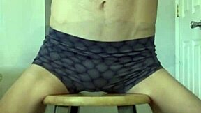 Hot Twink Stretches Tight Shorts on Stool Flexing