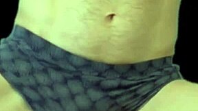 Hot Twink Stretches Tight Shorts on Stool Flexing